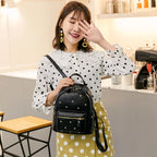 Luxury Black Leather Backpack – Minimal Rivet Mini Travel Bag